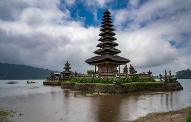 Fototapeta na wymiar Temple Pura Ulun Danu Bratan in Bali surrounded by a lake