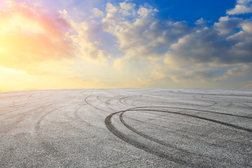 Car track square and sky beautiful cloud scenery at sunset