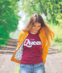 Young girl at the forest happy