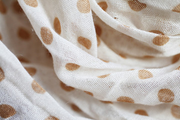 Crumpled polka dot fabric texture