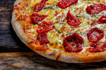 Pizza mozzarella with dried tomato