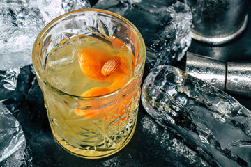  cocktail with dried apricots and pistachios on ice