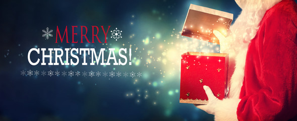Merry Christmas message with Santa opening a gift box on a shiny light background