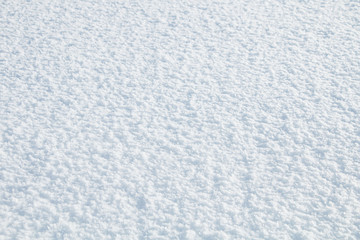Winter background. Texture of fresh cold white snow.