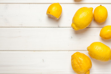 Composition of delicious citrus fruit on white background.