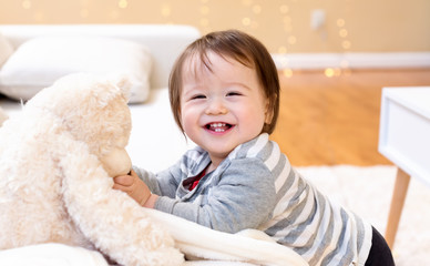 Fototapeta premium Happy toddler boy smiling in his house