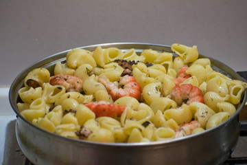 Seafood pasta with clams, prawns. Seafood Cocktail close up.