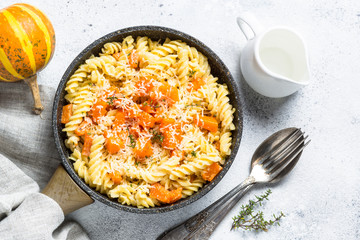 Pumpkin pasta with thyme, cream sauce and parmesan.