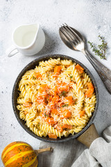 Pumpkin pasta with thyme, cream sauce and parmesan.