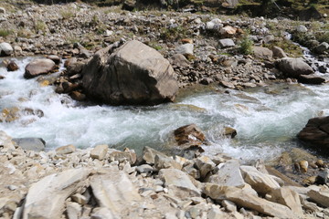 Small River Passing Through Between The Rocks
