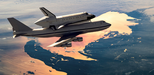 space shuttle and plane fly in space over earth atmosphere, elements of this image furnished by...