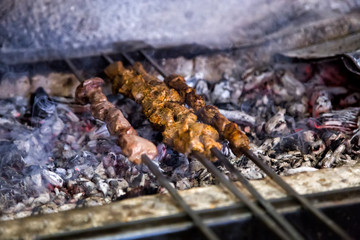 Shish kebab roasting on the barbacue. traditional kusleme kebap.Cooking meat on fire.