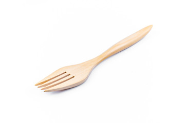 Only empty fork made of wood on white background. Top view. Isolated. Wooden.