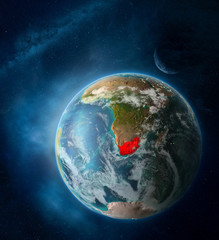 South Africa from space on Earth surrounded by space with Moon and Milky Way. Detailed planet surface with city lights and clouds.