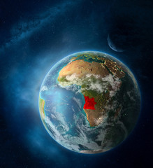 Angola from space on Earth surrounded by space with Moon and Milky Way. Detailed planet surface with city lights and clouds.