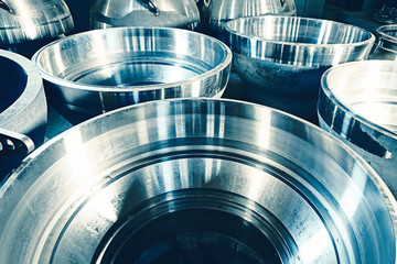 Large round metal parts are manufactured