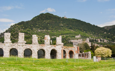 Fototapeta na wymiar Roman theater of the first century BC and Gubbio urban town on the hill