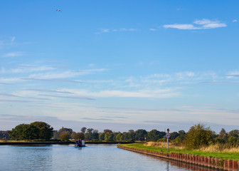 Fototapeta premium narrowboat cruising the Aire and Calder canal