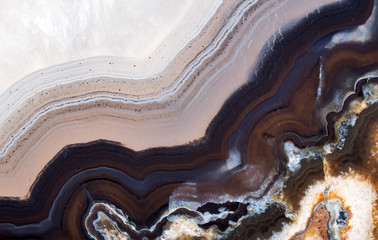 light and dark brown waves in agate