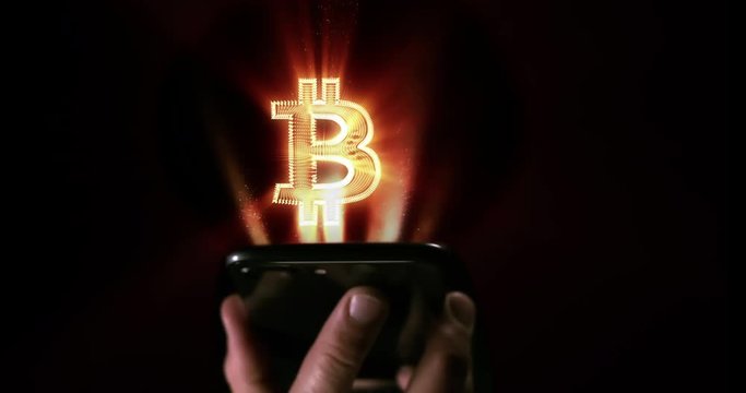 Smart phone with hologram of a bitcoin wallet projecting out of screen