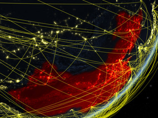 China on model of planet Earth with network at night. Concept of new technology, communication and travel.