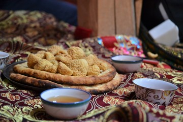 Tea drinking in Central Asia, Tajikistan, tea ceremony and hospitality, at a wedding in Tashkurgan Xinjiang
