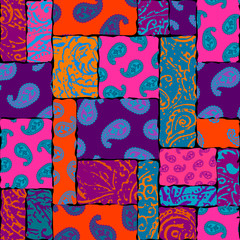 Seamless background pattern. Patchwork pattern with Paisley ornament patterns. Bright magenta and orange colors. Ethnic indian style.