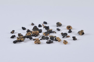 Chinese black tea and Infusions. Heap of dry tea leaf.