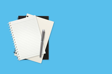 workspace business table with office supplies on blue pastel background