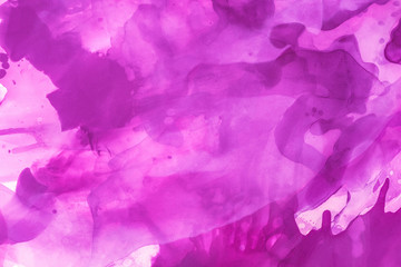 beautiful violet splashes of alcohol ink as abstract background