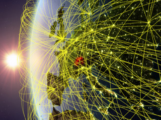 Switzerland from space on model of Earth during sunset with international network. Concept of digital communication or travel.