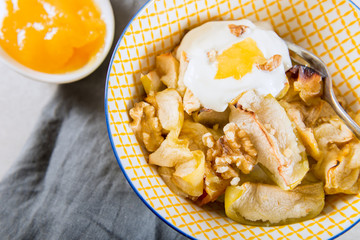 Stewed Apple with Cinnamon, baked in the oven and topped with wa