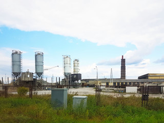 Panorama of the plant for the manufacture of various products. Production for the needs of the population. Industrial architecture and technical premises. Place of paid labor.