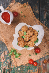 Vietnamese food. Delicious homemade fish balls on wooden table.