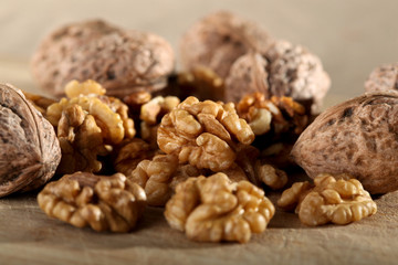 Close up of walnuts on the wooden board