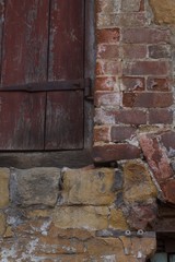 old brick wall with a window