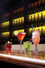 Three diferent cocktails on the bar