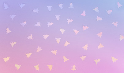 Colorful celebration background with party confetti on pastel blue background.