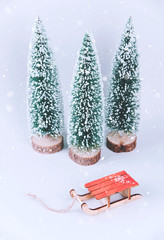 Stylish vintage wooden sled with xmas tree.