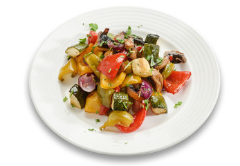 Sliced vegetables baked in the oven nice serving on a plate