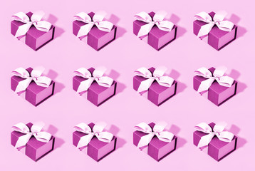 Pattern made of pink gift boxes.