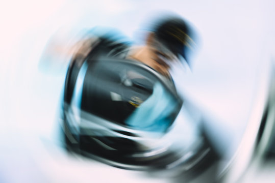 Royalty high quality free stock photo of abstract blur and defocused Unidentified man car cleaner. A man cleaning car with microfiber cloth, car detailing (or valeting) concept. Radial blur