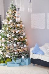 Christmas decor for table setting, or wedding decor, studio with a Christmas tree. Christmas decorations toys, candles, fir branches