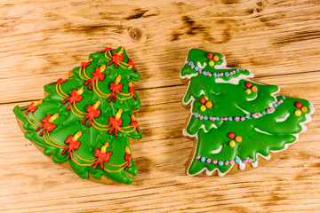 Gingerbread christmas trees on a wooden table