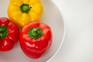 Fresh red and yellow peppers  on white background, pepper isolated,