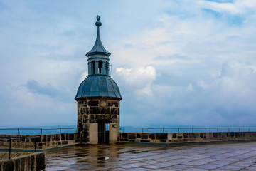 Fototapeta na wymiar Castle lookout against a pale blue sky