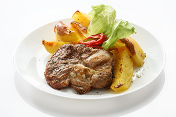 Grilled steak with potatoes
