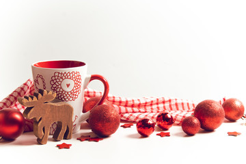 ball gloss with coffee cup and reindeer wood toy and season greeting merry christmas prop decoration on white background
