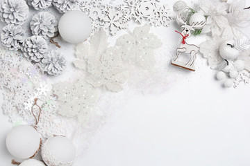 Christmas decorative composition of toys on a white table background. Top view. Flat Lay