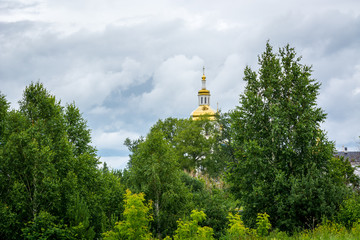 Old Christian Church is behind the trees
